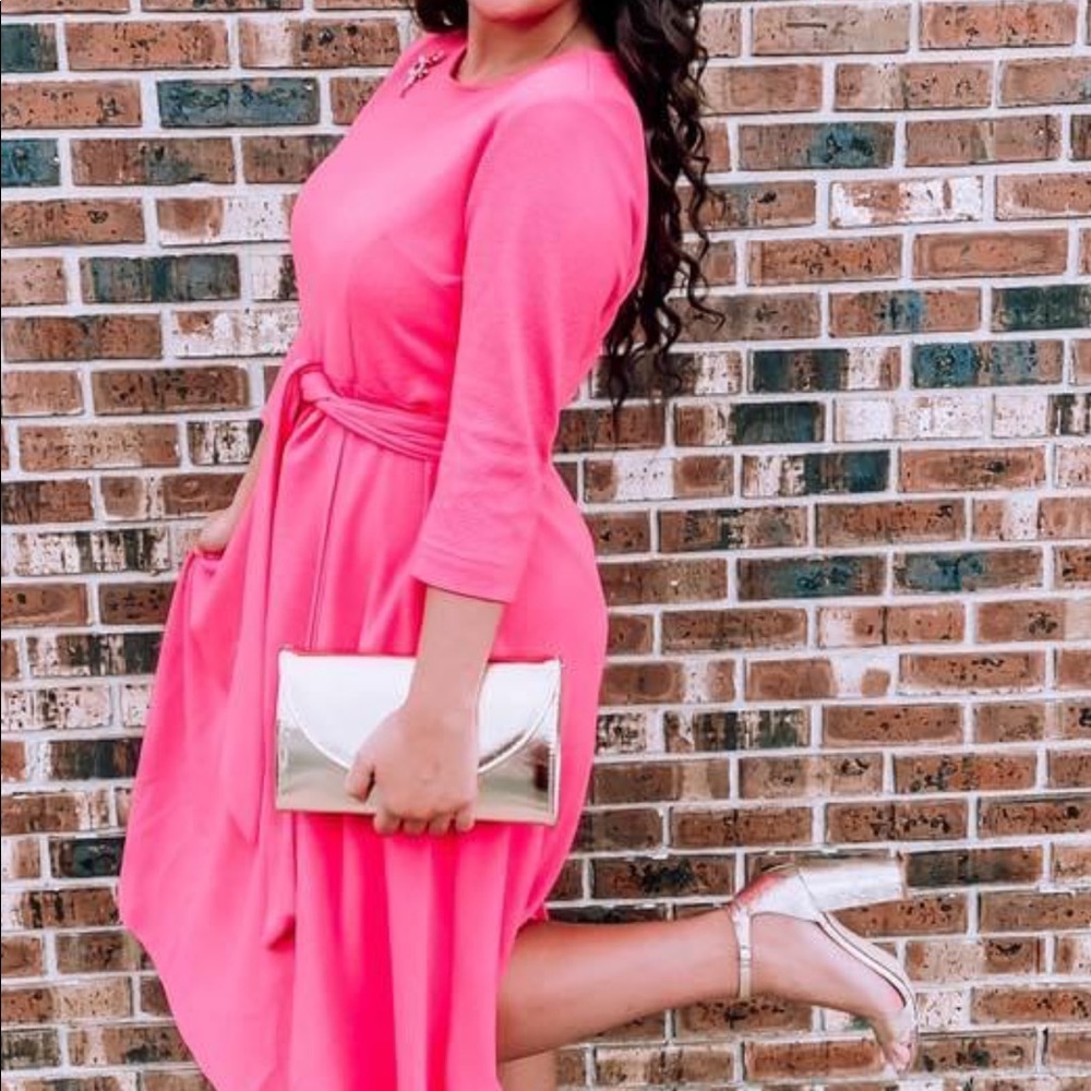 Dainty Jewell’s hot pink dress